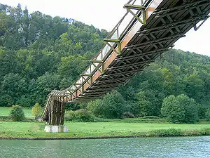 A stressed ribbon pedestrian bridge near Essing, using a fabricated deck.