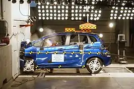 Crash test of car striking a wall