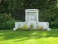 Gravestone with a reproduction of Michelangelo's Pietà.