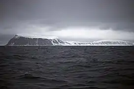 Iversenfjellet and Kapp Thor viewed from the ship Lance.