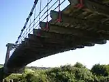 From beneath, showing crossbeams and hangers