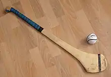 Image 43Hurling ball (sliotar) and hurley (camán) (from Culture of Ireland)