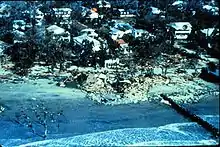 Aerial view of debris strewn about a beach