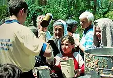 Hare Krishna devotees distributing vegetarian meals.