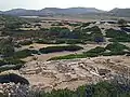 East Basilica from the top of East Akropolis. Harbor area in background.