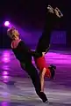 The male skater performs an outside spread eagle(Isabelle Delobel & Olivier Schoenfelder)