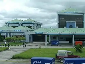 Green buildings with pyramid-shaped roofs