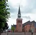 The stand-alone bell tower of the church in 2012