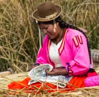 Uro woman knitting.