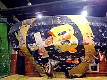 Bouldering at an indoors bouldering centre in Pasila, Helsinki, Finland