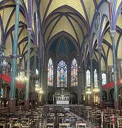 Nave facing the choir, lined with cast-iron columns