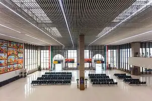 Interior of the airport, with two departure gates leading to the apron