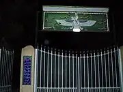 Faravahar on the gate of a Zoroastrian temple, Iran.