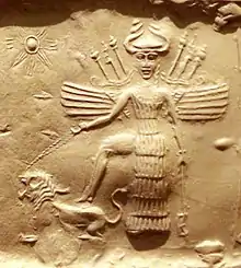 Goddess Ishtar on an Akkadian Empire seal, 2350–2150 BC. She is equipped with weapons in her back, has a horned helmet, and is trampling a lion.