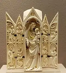 14th-century French ivory triptych showing the Annunciation, Visitation, Adoration of the Magi, Nativity (with Joseph holding the baby while Mary sleeps), Presentation.