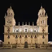 Main façade at night.