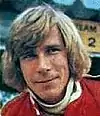 A portrait of James Hunt in racing uniform