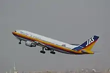 An Airbus A300-600R in the air during take-off