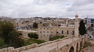 Old stone bridge linking modern and ancient Jerash