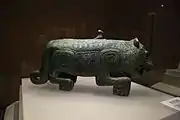 Bronze tiger with bird