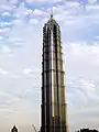 The Jin Mao Tower with the construction of the Shanghai World Financial Center at the background