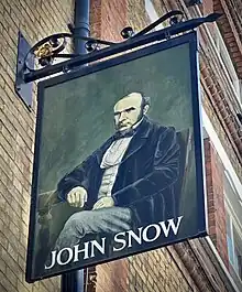 Sign outside on Broadwick Street wall