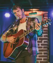 McLaughlin performing at Duck Room on Blueberry Hill in 2013