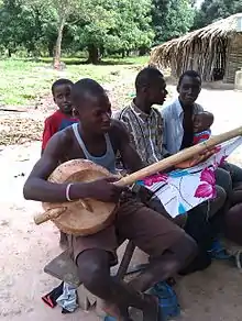 Senegal, akonting. Possibly related to banjo.