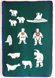 Image 41Indigenous peoples textile art in 1995 by Julia Pingushat, including Inuk, Arviat, Nunavut, Canada, wool, and embroidery floss (from Indigenous peoples of the Americas)