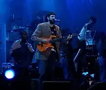 Image 50Dominican singer/songwriter Juan Luis Guerra in concert, 2005 (from Culture of the Dominican Republic)