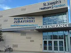 The main entrance of a building with glass doors