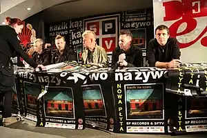 Kazik Na Żywo signing autographs, 5 December 2011 in Warszawa