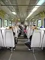 The (modified—with walls cut open and additional handle bars) interior of a KTM Class 81 EMU