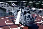 A Kamov Ka-27PL helicopter on the deck of destroyer Admiral Kharlamov.