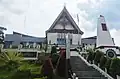 The standard of Sisingamangaraja in front of a governmental building in North Tapanuli.