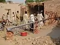 People preparing ALAM for Kali Bair graveyard.