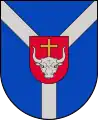 A coat of arms depicting a grey bull's head with a golden cross protruding from the top all on a red crest on a blue background