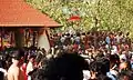 Flag-off for Kavutheendal, symbolically marked by lifting of a red, decorated umbrella.