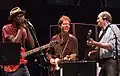 Keb'Mo (left), James Taylor (right) and Nick Forster (center) perform on eTown.