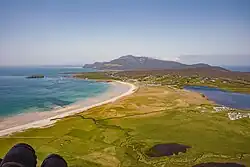 Keel and its beach seen from Minaun, with Croaghaun mountain in the distance