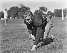 Photo of Fields playing football at West Point