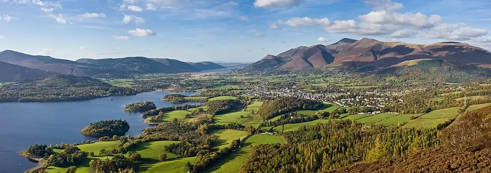 Image 1Lake DistrictPhoto: David IliffA panoramic view of Skiddaw mountain, the town of Keswick, and Derwentwater, as viewed from Walla Crag on a clear autumn afternoon in the Lake District. Located in North West England, the district is a popular tourist destination and is famous for its lakes and mountains, especially those within its national park.More featured pictures