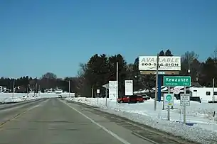 Sign at the city limits at the south of the city along Highway 42