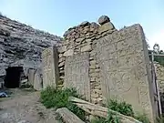 One of the series of khatckhars on the south side of the monastery (currently reused as part of a partition wall) (2014 photo)