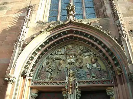 Tympanum above the main entrance, with Annunciation and Coronation of Mary