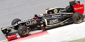 Kimi Räikkönen driving the Lotus E20 at the 2012 Malaysian Grand Prix.