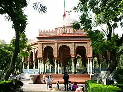 Alameda de Santa María la Ribera.  In the background lies the Morisco Kiosk