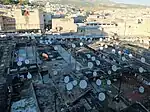 Rooftop view of the Kissaria in 2014, prior to recent renovations, with flat concrete roofs