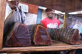 Vendors in Antananarivo, Madagascar selling koba.