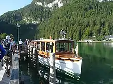 An electric passenger launch at Schönau on the lake